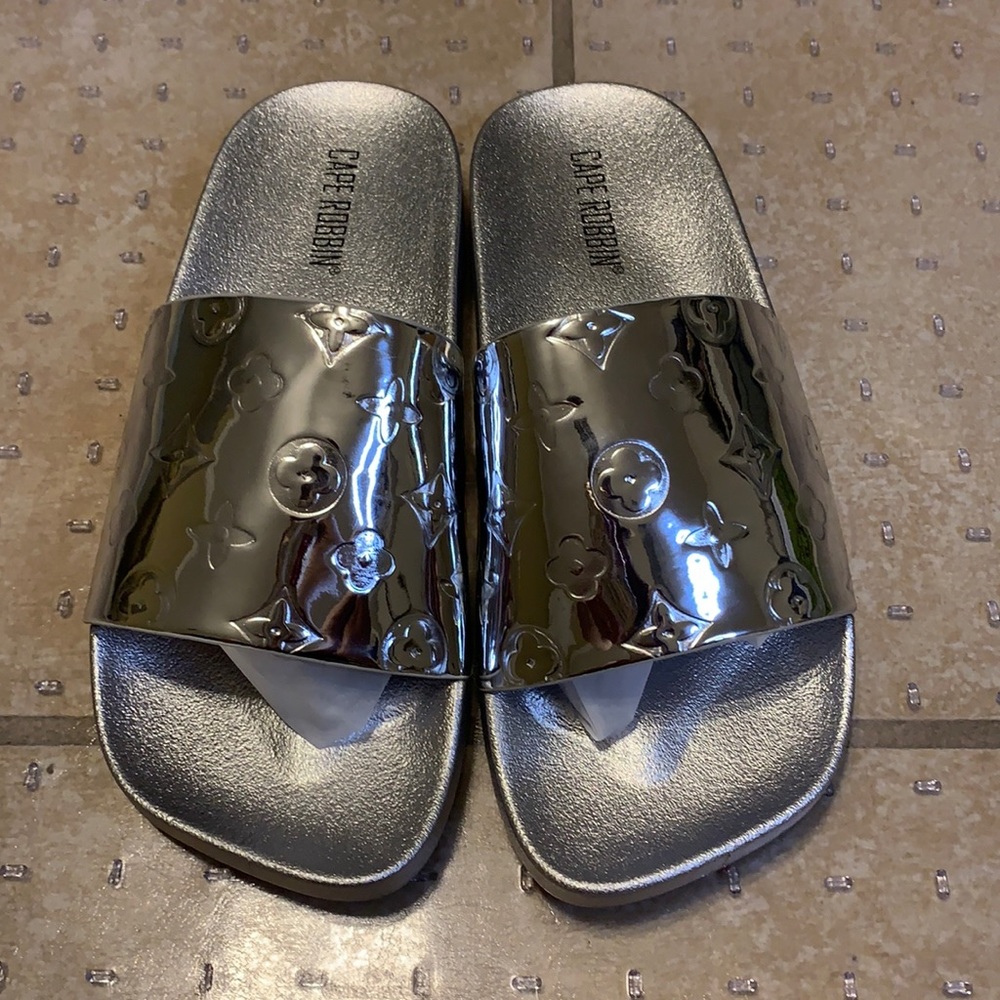 Women’s silver metallic slides